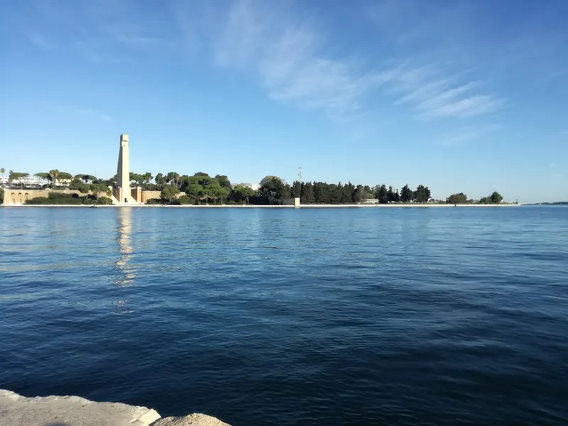The Monumento al Marinaio across the sea at Brindisi on a sunny day